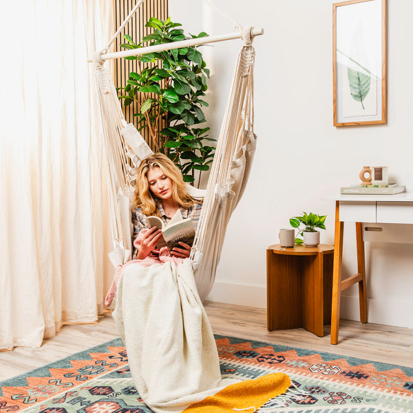 Beige hammock chair styled in a room