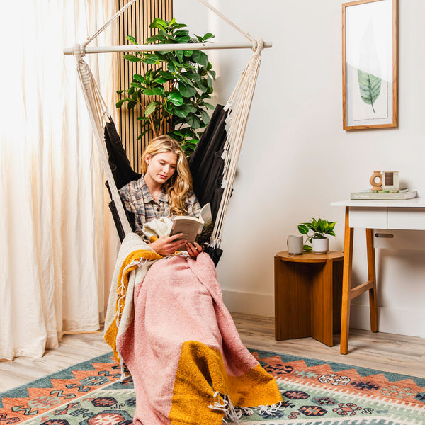 Black hammock chair styled in a room