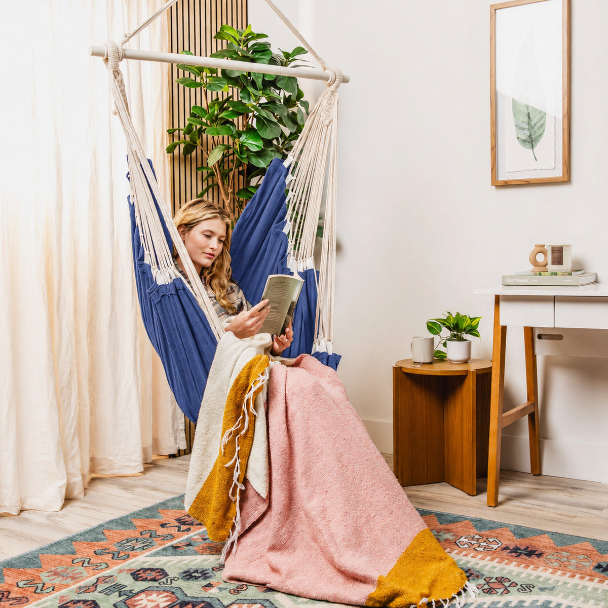 Navy hammock chair styled in a room