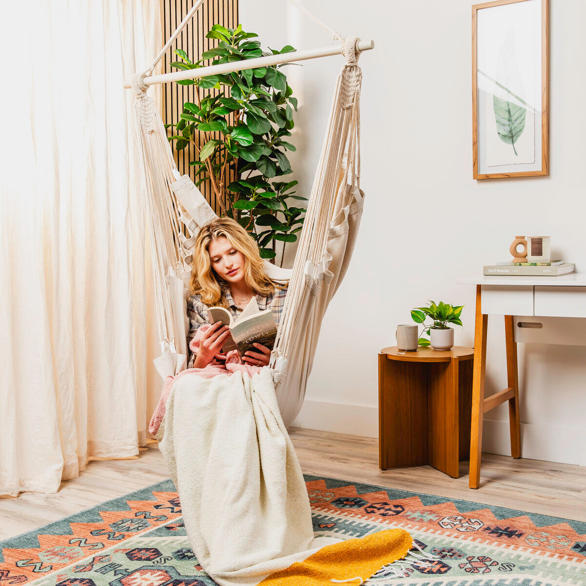 Beige hammock chair styled in a room